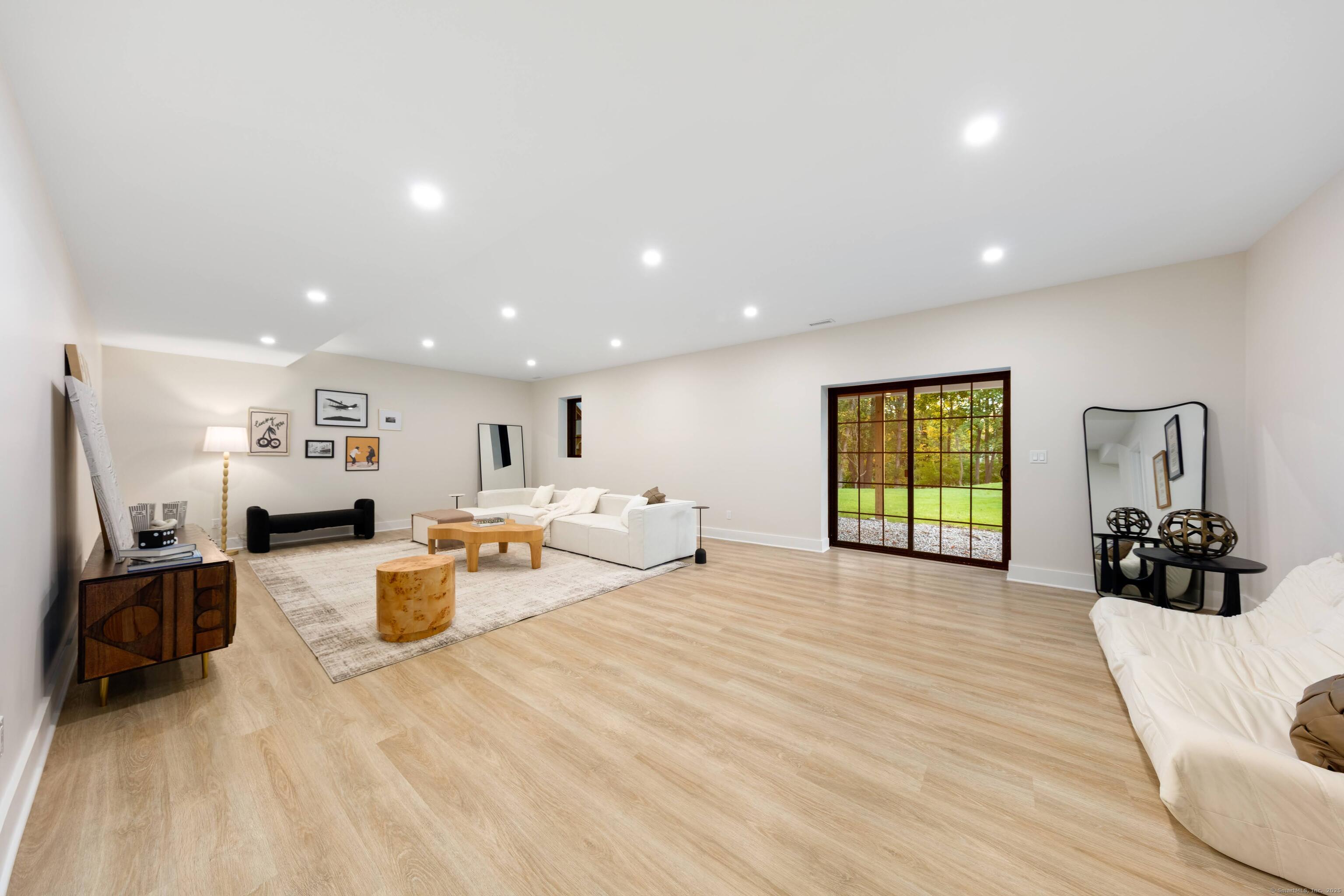 31 Gray Farms Road Stamford, CT 06905 - Photo 32 of 40 a large room with a bed and a couch