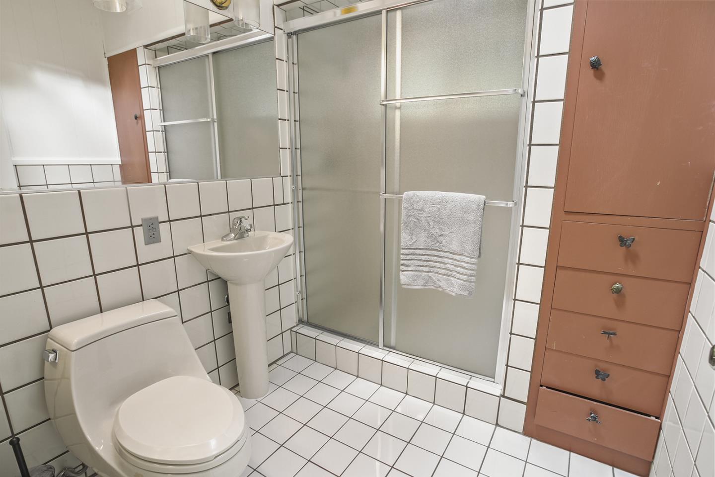 320 Grandview Drive Woodside, CA 94062 - Photo 18 of 43 a bathroom with a toilet and a shower