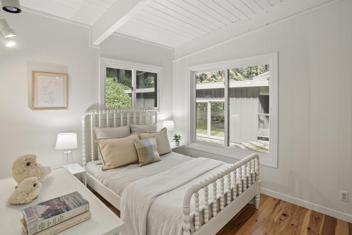 320 Grandview Drive Woodside, CA 94062 - Photo 19 of 43 a bedroom with a bed and a window