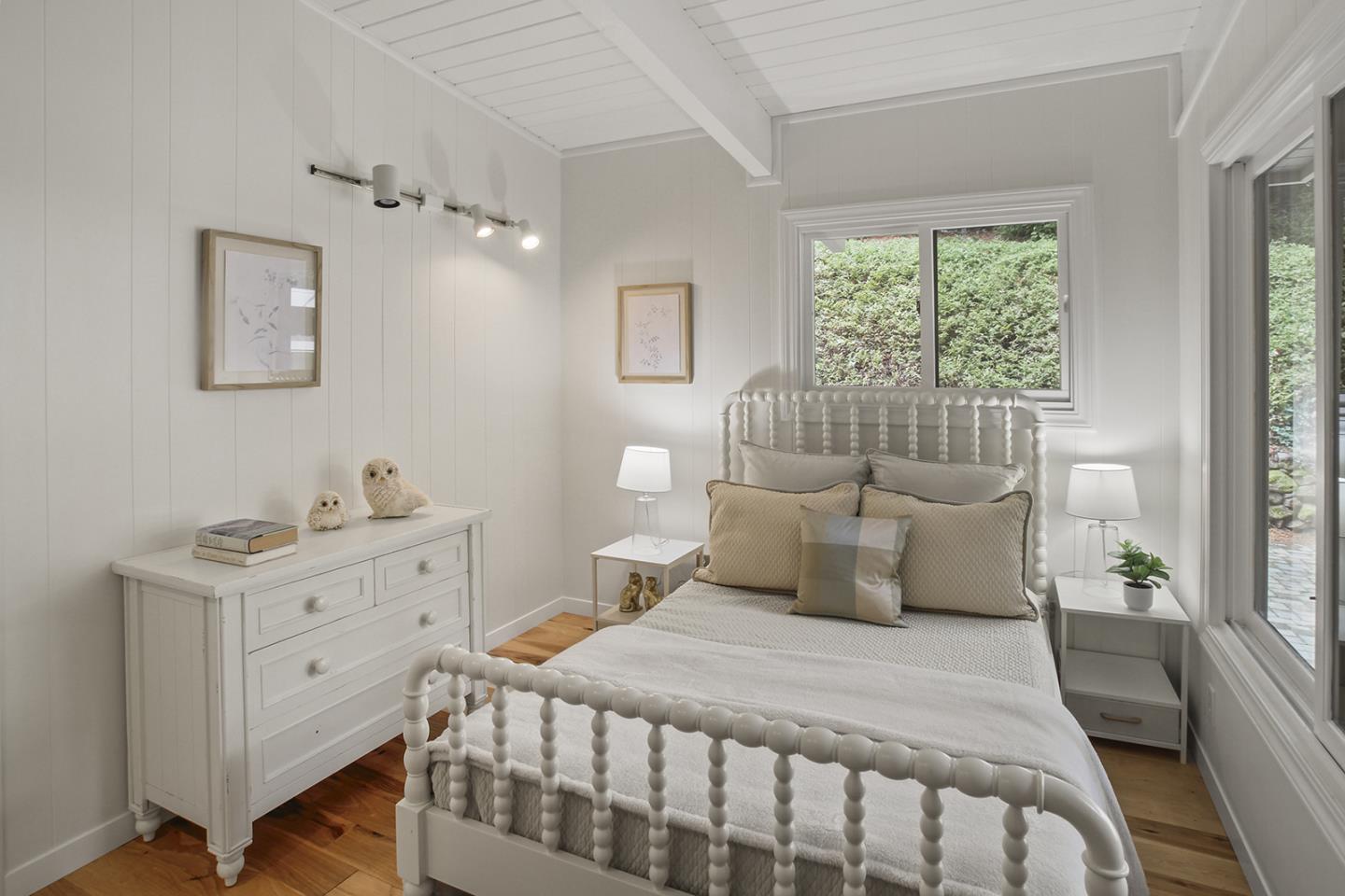 320 Grandview Drive Woodside, CA 94062 - Photo 20 of 43 a bedroom with a bed and window