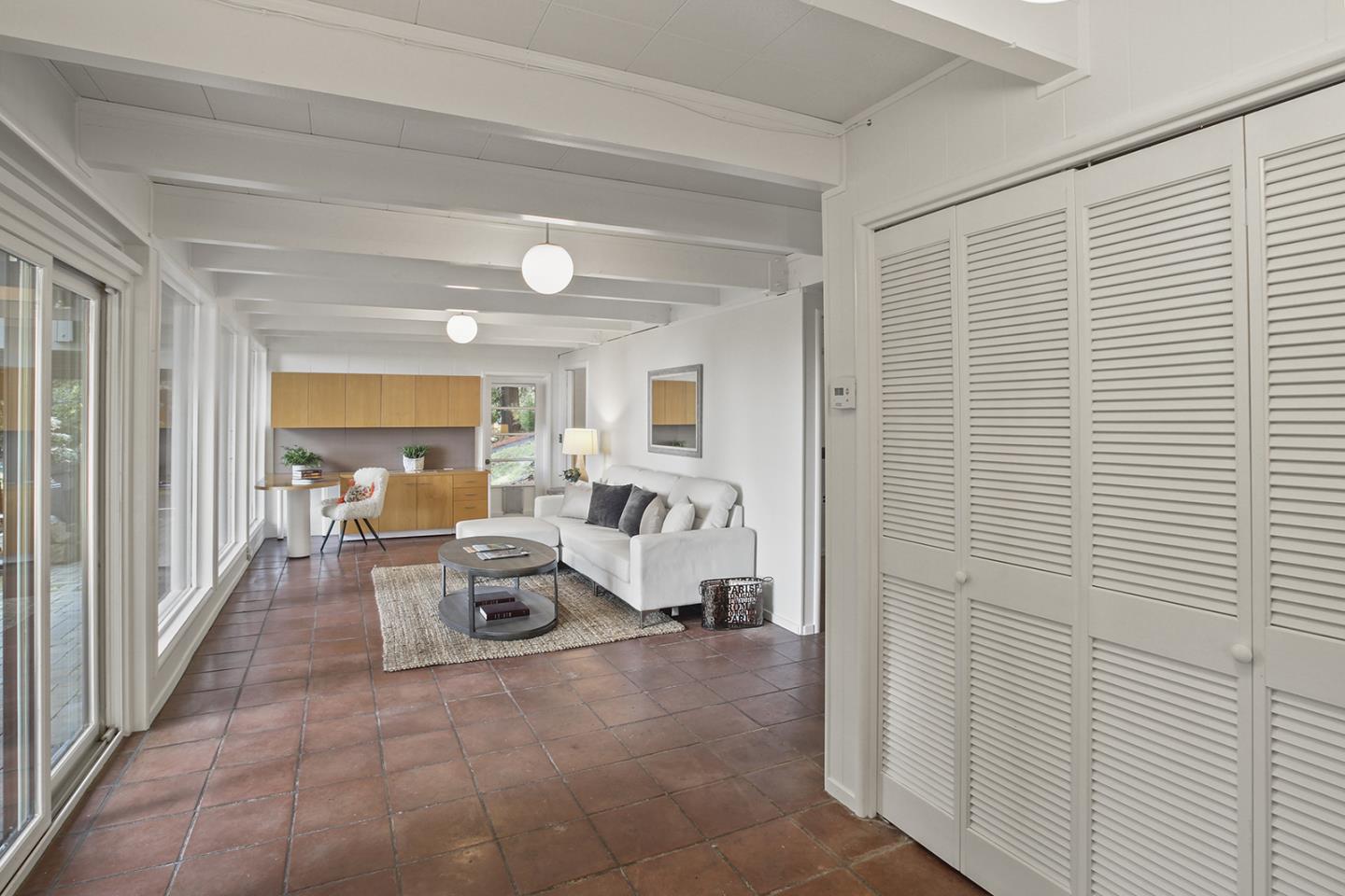 320 Grandview Drive Woodside, CA 94062 - Photo 22 of 43 a living room with furniture and a window