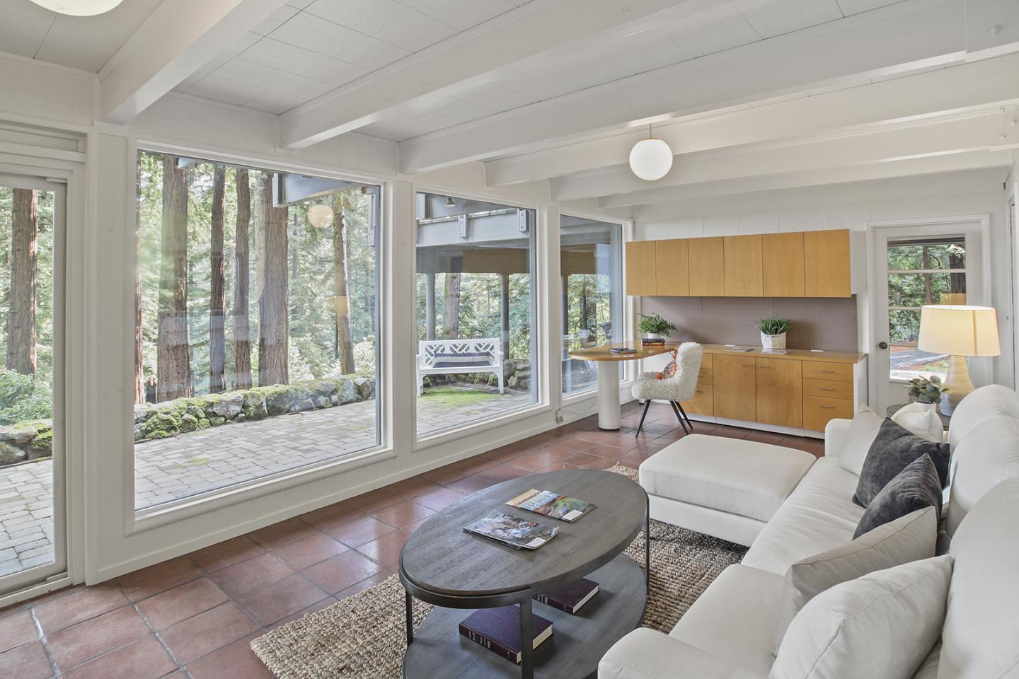 320 Grandview Drive Woodside, CA 94062 - Photo 23 of 43 a living room with furniture and a large window