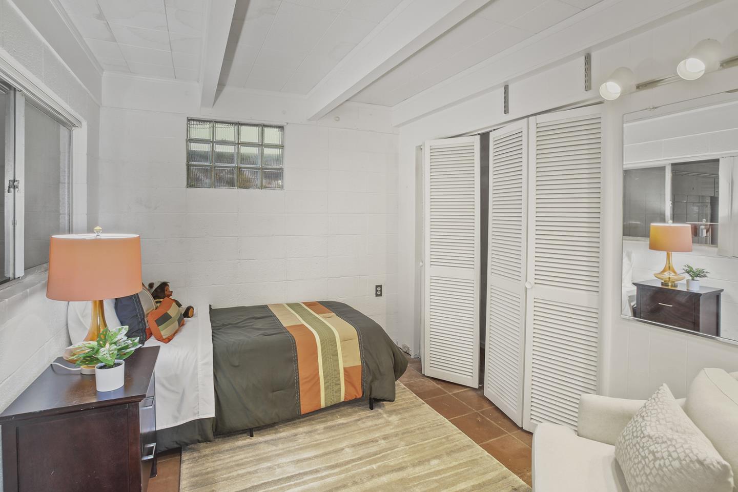 320 Grandview Drive Woodside, CA 94062 - Photo 24 of 43 a bed room with a bed and a couch