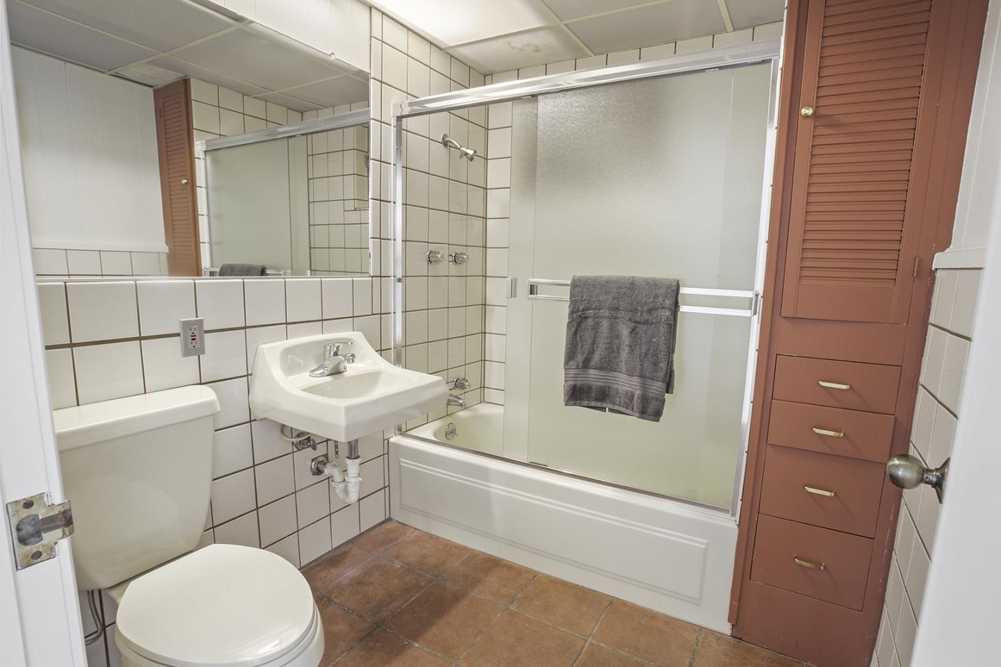 320 Grandview Drive Woodside, CA 94062 - Photo 25 of 43 a bathroom with a sink toilet and shower