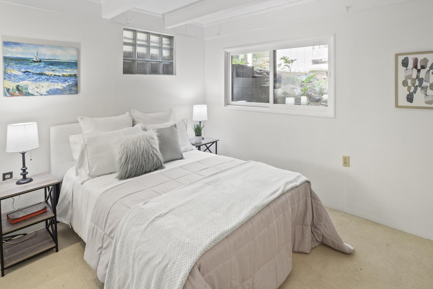 320 Grandview Drive Woodside, CA 94062 - Photo 26 of 43 a bedroom with bed and a window