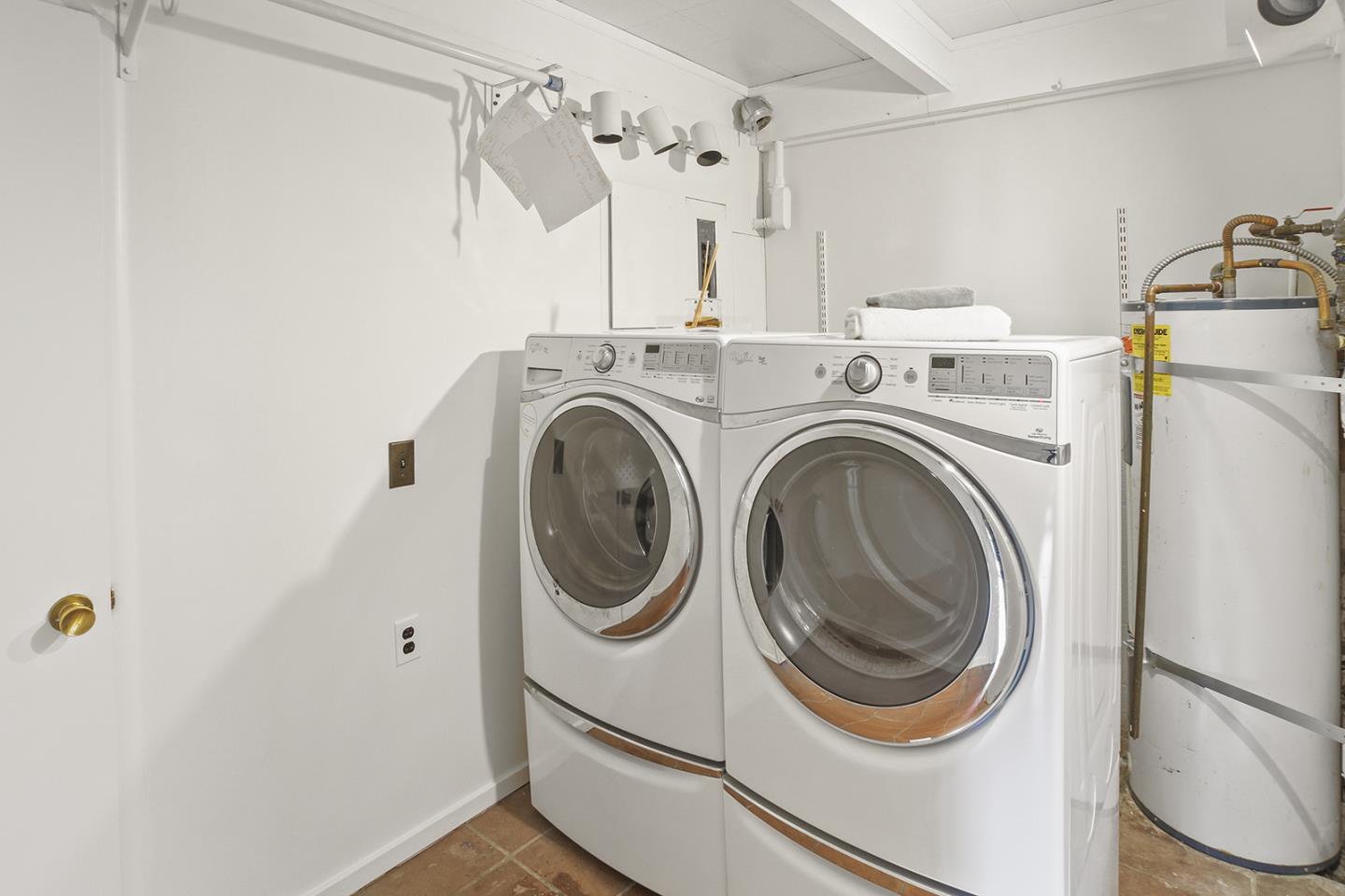 320 Grandview Drive Woodside, CA 94062 - Photo 28 of 43 a utility room with dryer and washer