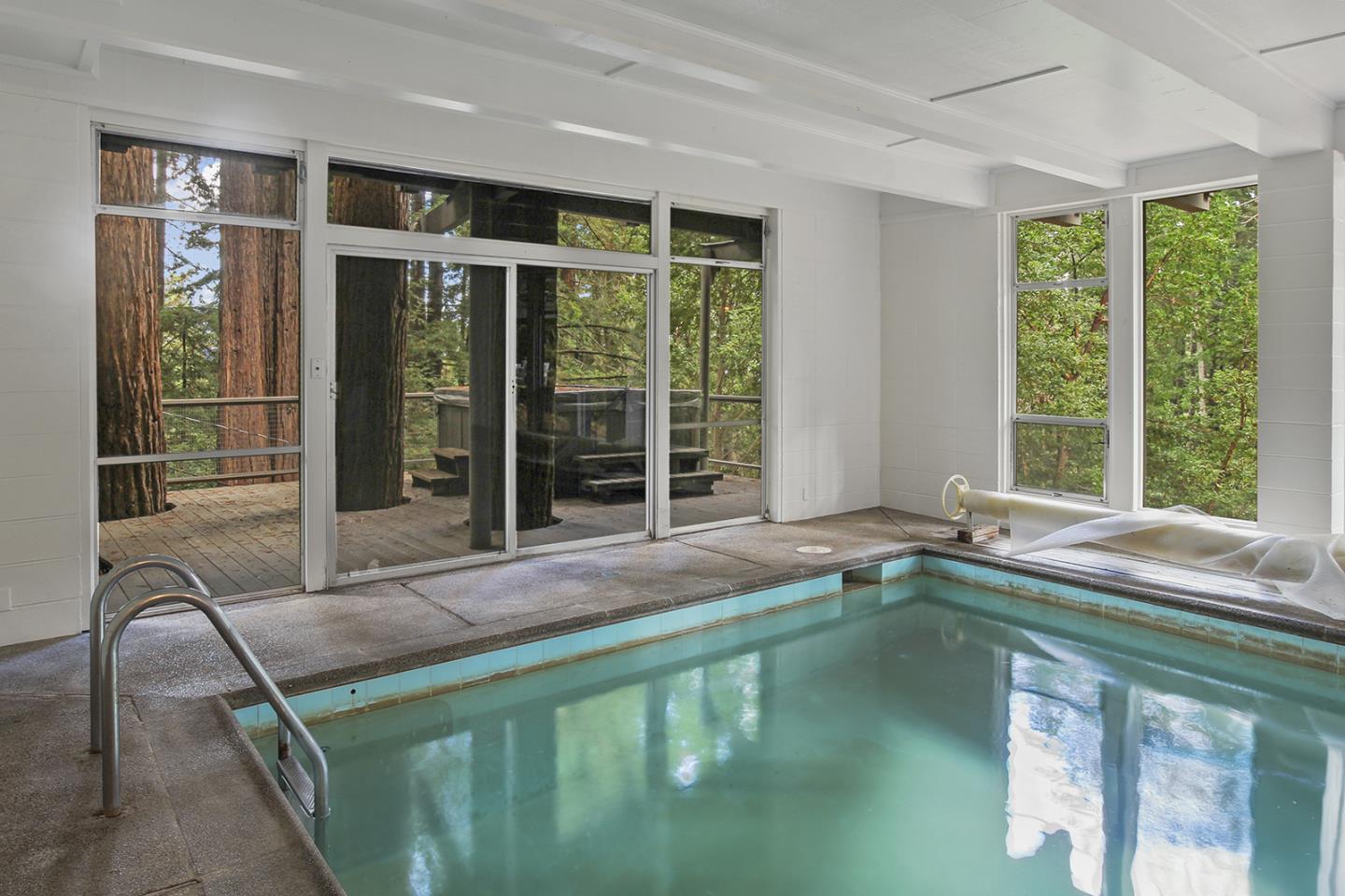 320 Grandview Drive Woodside, CA 94062 - Photo 32 of 43 a indoor swimming pool in the back yard of the house