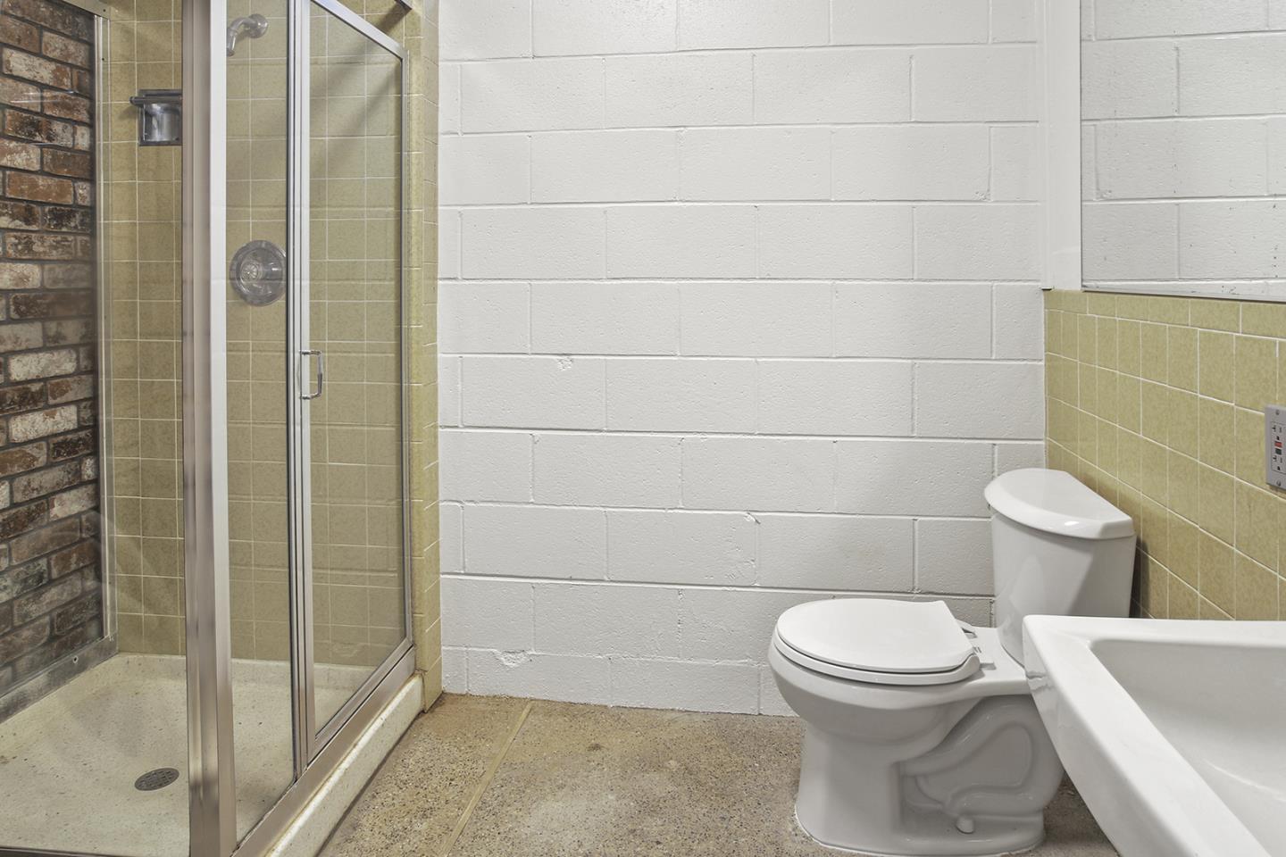 320 Grandview Drive Woodside, CA 94062 - Photo 33 of 43 a bathroom with a toilet and shower