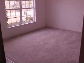2450 Southeast Ralph Palm Bay, FL 32909 - Photo 4 of 8 an empty room with a window