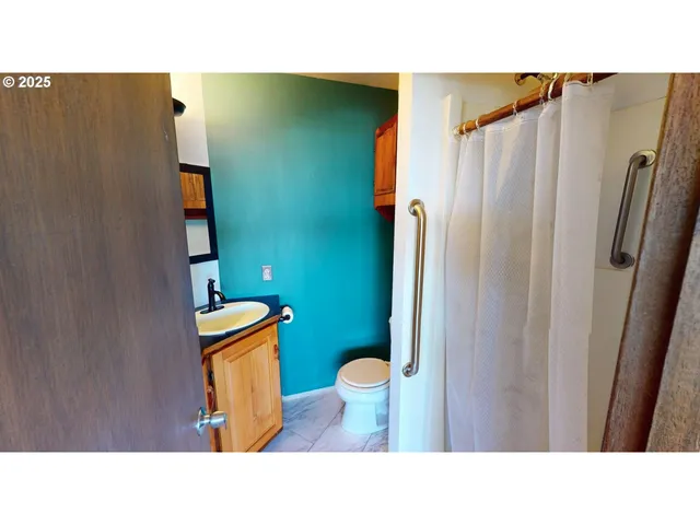 a bathroom with a sink and a toilet