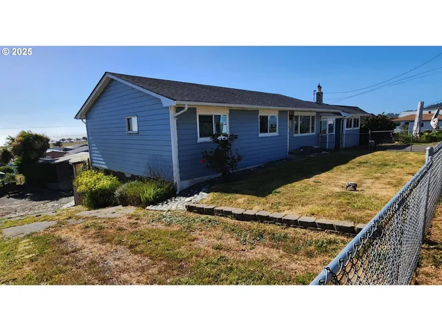 a black and white photo of a house