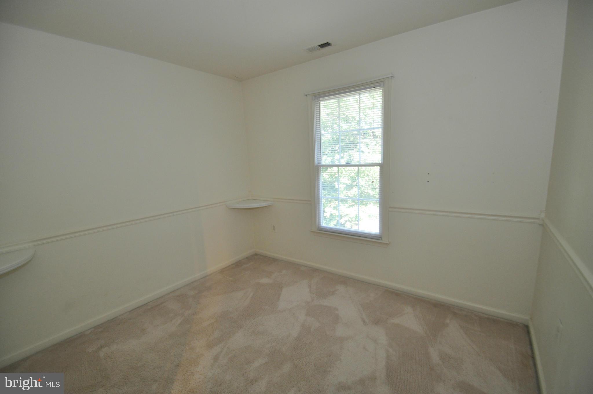 1109 Oak View Drive Mount Airy, MD 21771 - Photo 11 of 18 an empty room with windows