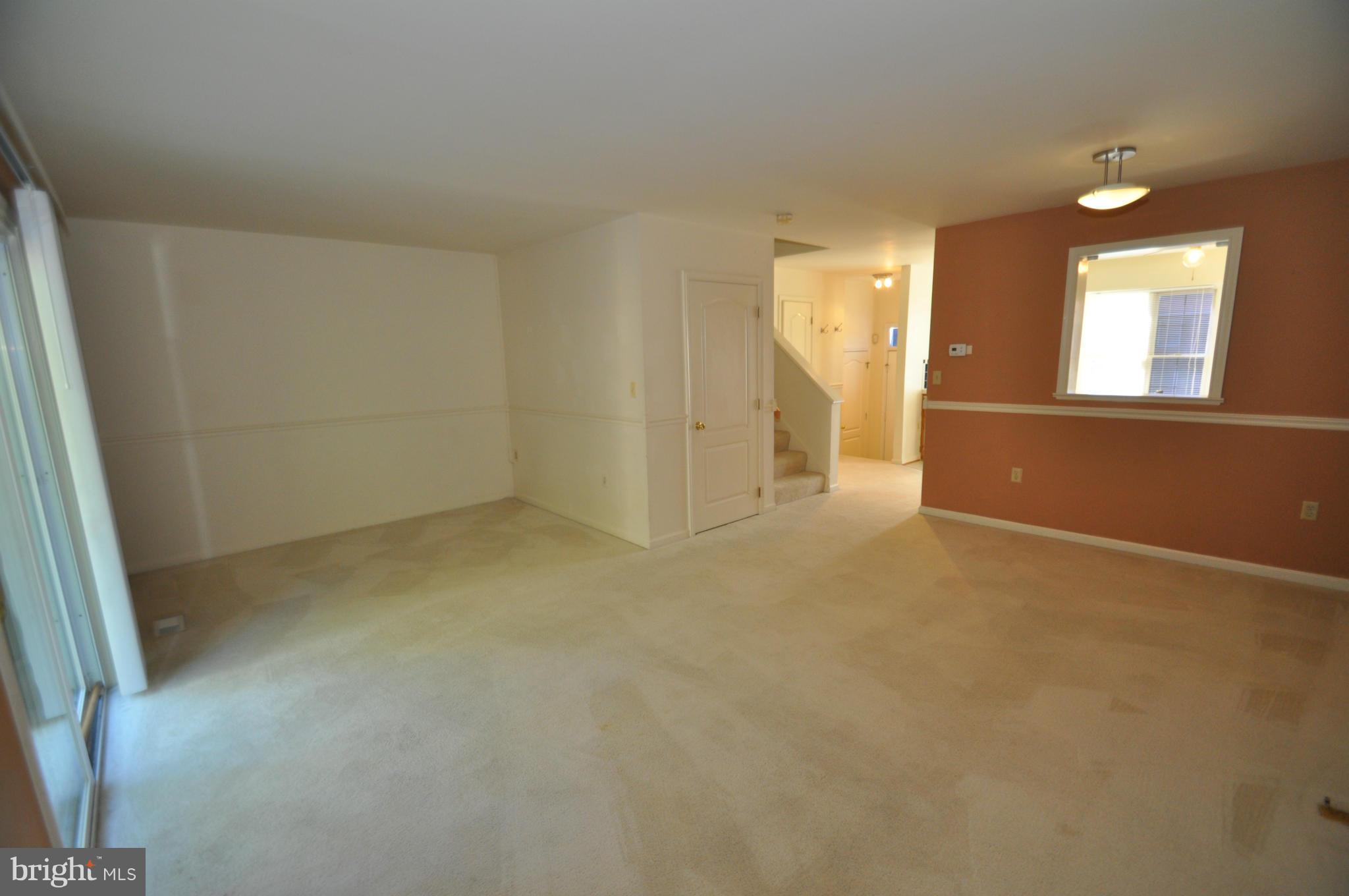1109 Oak View Drive Mount Airy, MD 21771 - Photo 7 of 18 an empty room with a empty space and windows