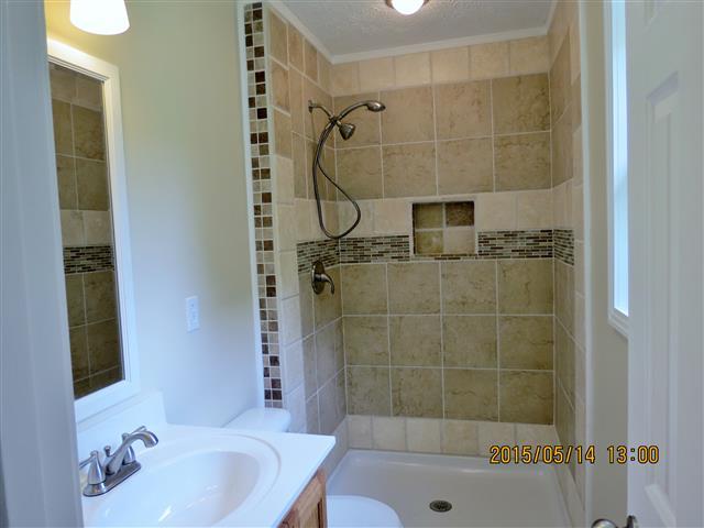 3851 Waverly Road Tennessee Ridge, TN 37178 - Photo 10 of 20 Master bath with custom built ceramic tile shower & new bath fixtures.