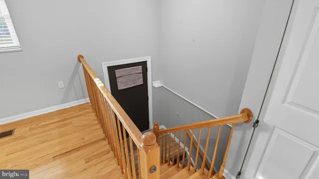 a kitchen with stainless steel appliances granite countertop a stove and a refrigerator