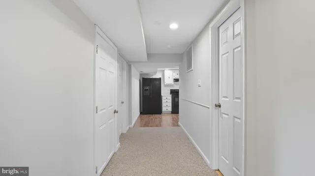 a bathroom with a shower and a sink
