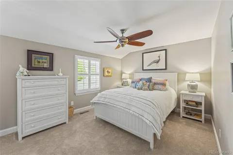 a bedroom with a bed and a cabinets