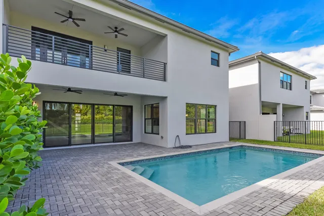 a view of a house with a swimming pool