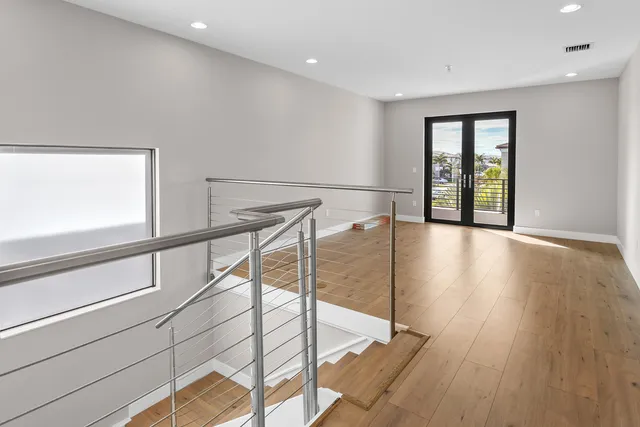 a view of entryway with wooden floor