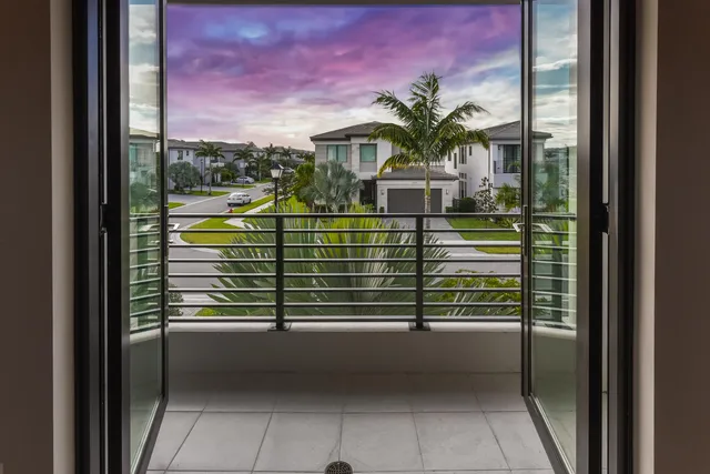 a view of potted plant in front of a door