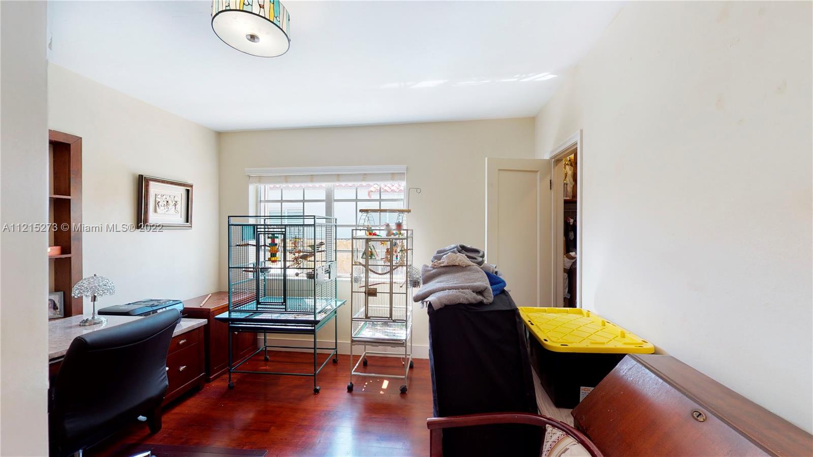 619 Southwest 20th Road Miami, FL 33129 - Photo 13 of 25 a living room with furniture and a window