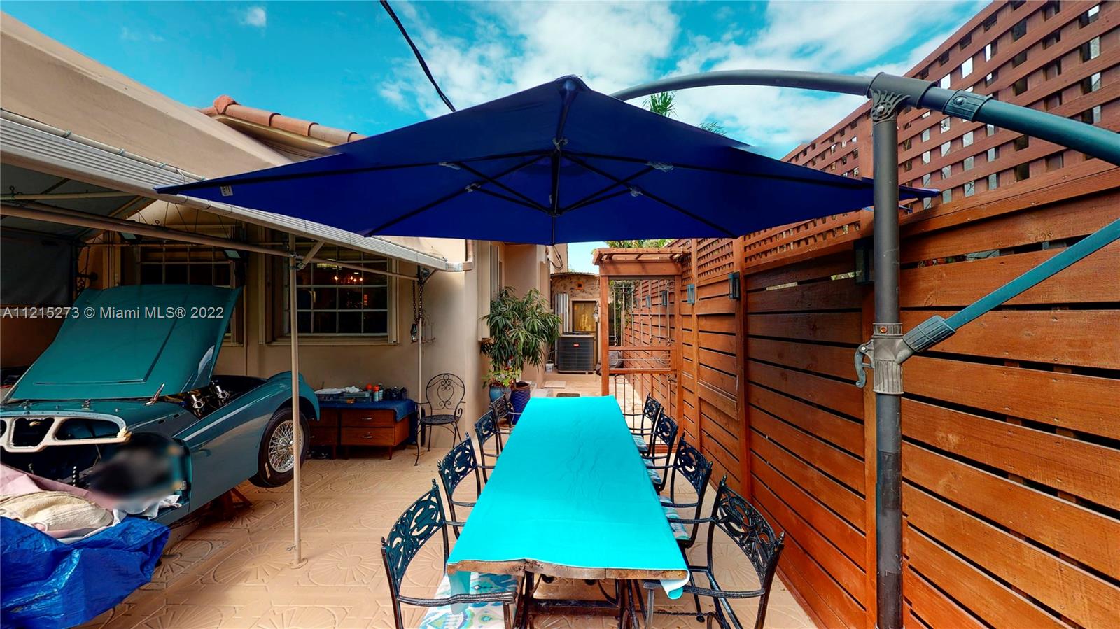 619 Southwest 20th Road Miami, FL 33129 - Photo 17 of 25 a view of a chairs and table in the patio
