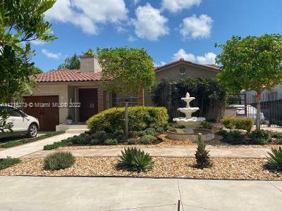 619 Southwest 20th Road Miami, FL 33129 - Photo 25 of 25 a front view of a house with a yard