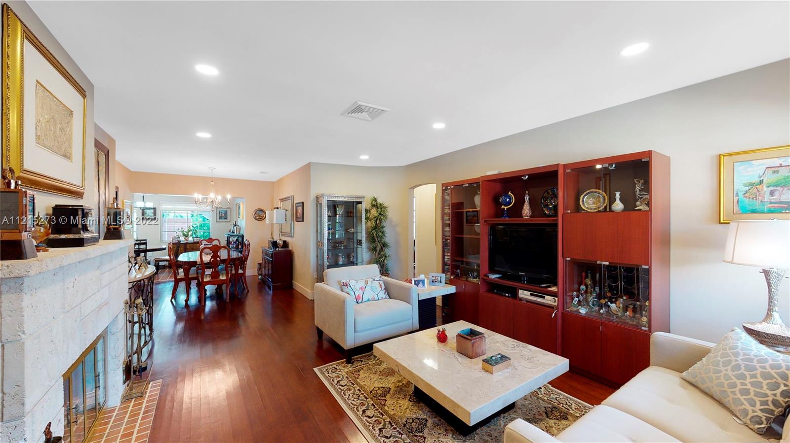 619 Southwest 20th Road Miami, FL 33129 - Photo 8 of 25 a living room with furniture and a flat screen tv