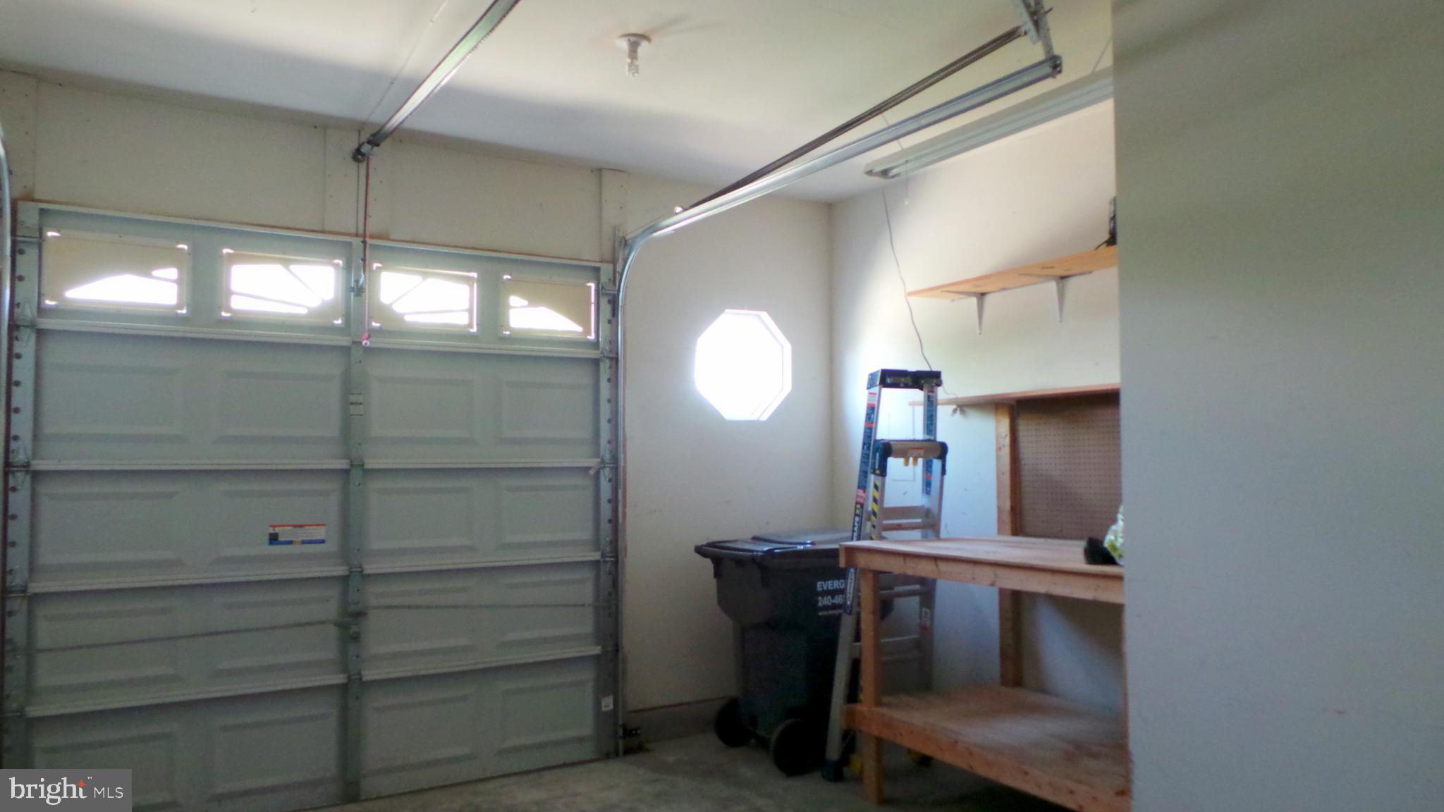 625 Ruxton Road, Unit 73 Solomons, MD 20629 - Photo 32 of 50 1 Car Garage with work bench