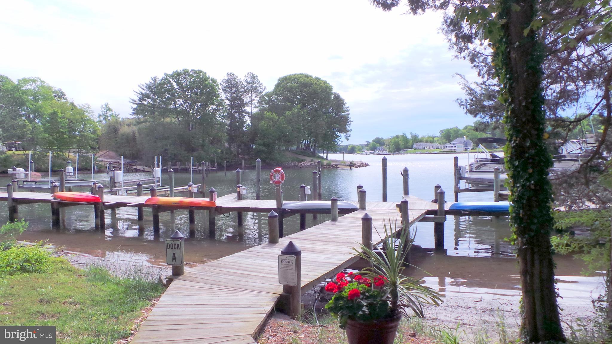 625 Ruxton Road, Unit 73 Solomons, MD 20629 - Photo 37 of 50 Walk-way to boat slips in private marina