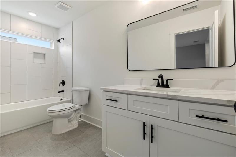 131 Old Alabama Road Southeast Emerson, GA 30137 - Photo 34 of 44 a bathroom with a toilet sink and mirror