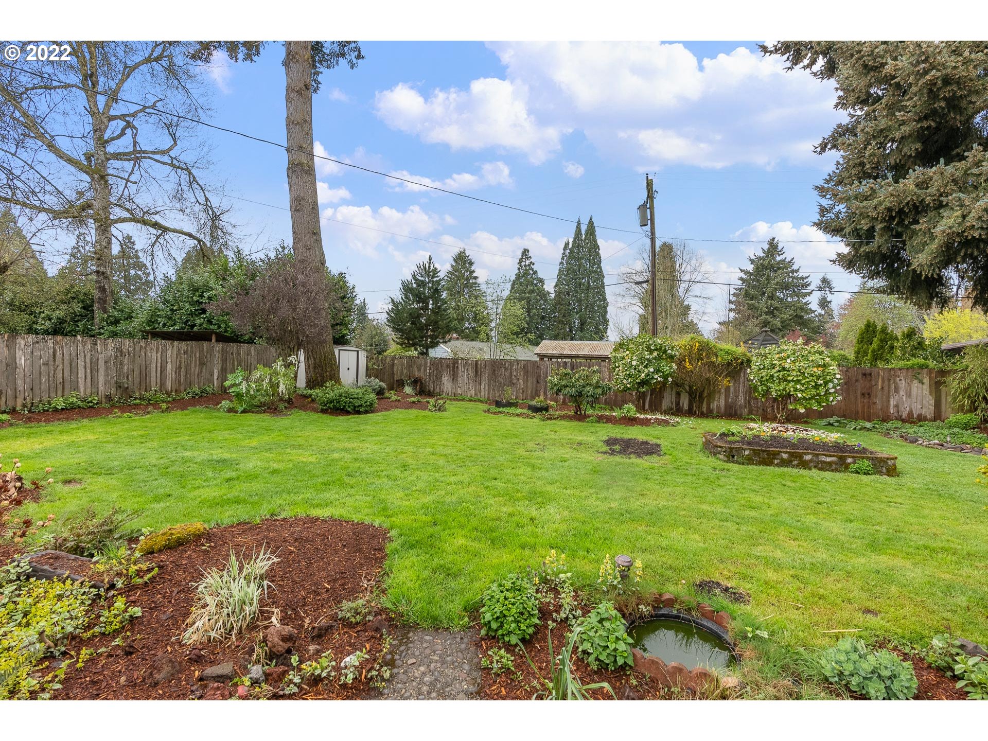 2900 Manor Drive Springfield, OR 97477 - Photo 26 of 32 a view of a yard with a fountain