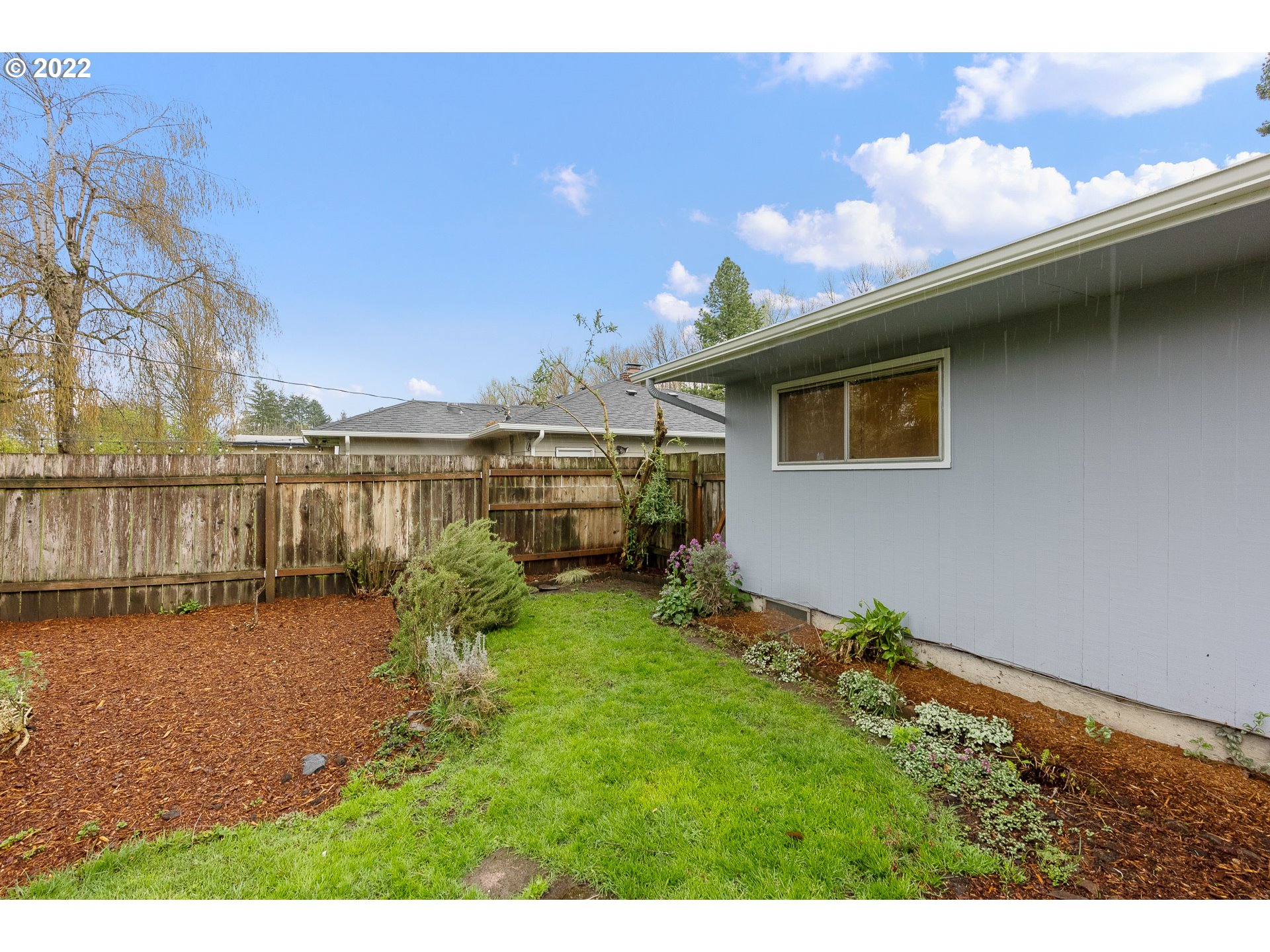 2900 Manor Drive Springfield, OR 97477 - Photo 30 of 32 a backyard of a house with table and chairs