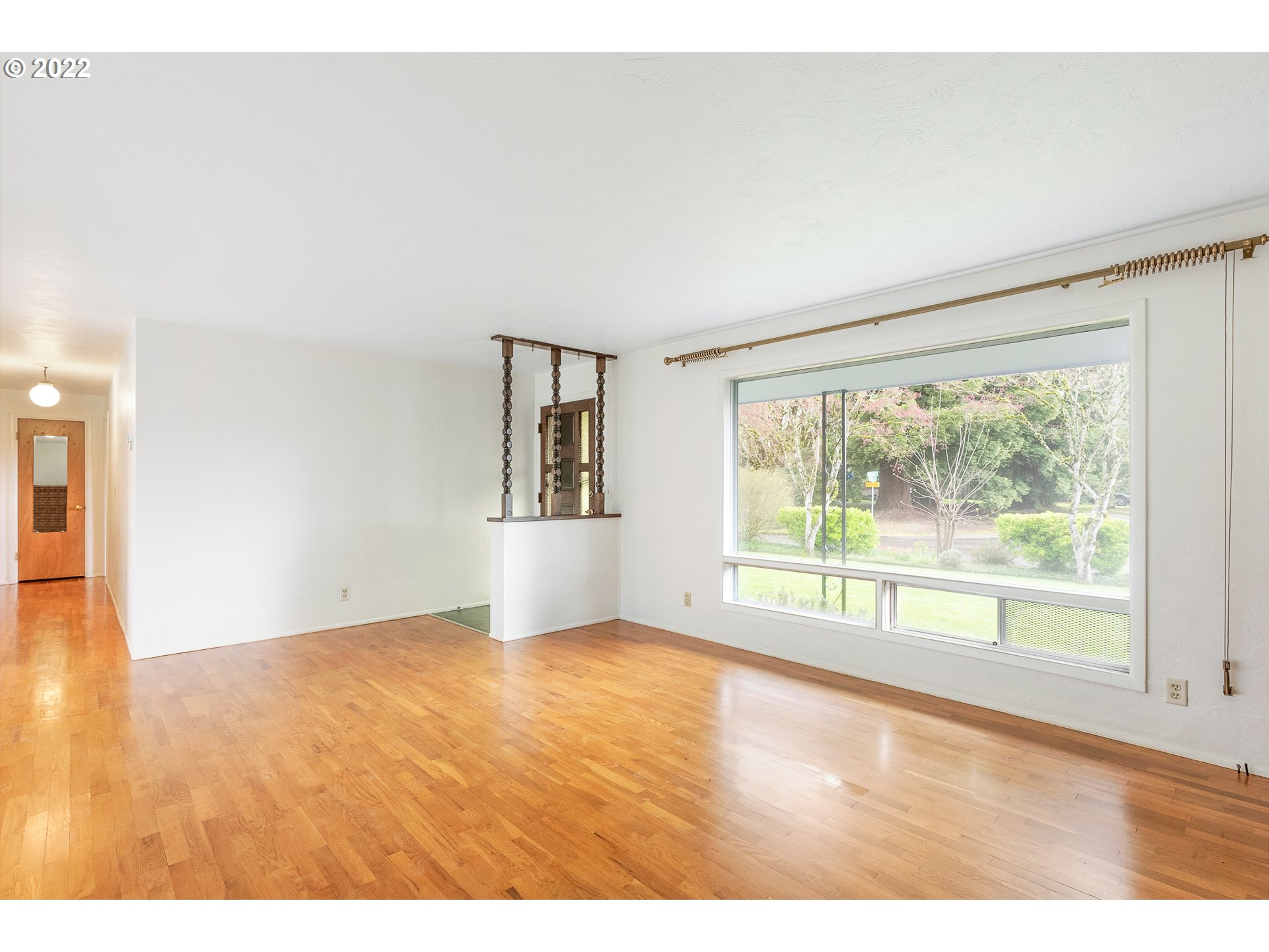2900 Manor Drive Springfield, OR 97477 - Photo 5 of 32 a view of empty room with wooden floor and fan