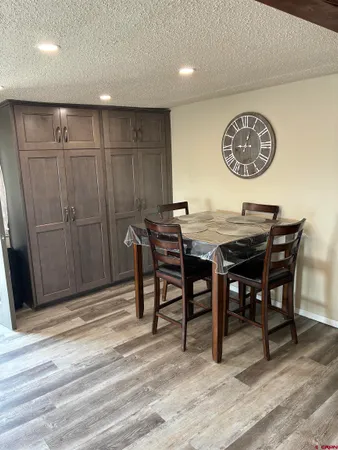 a view of a table and chairs in a room