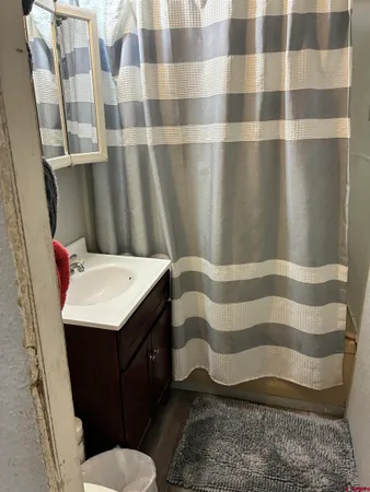 a bathroom with a sink and toilet