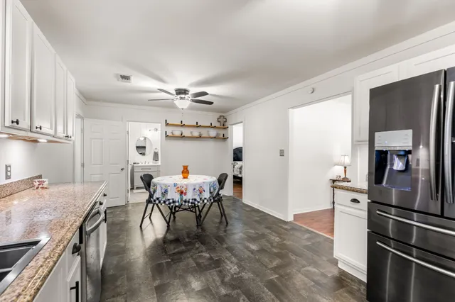 a view of a dining room with furniture