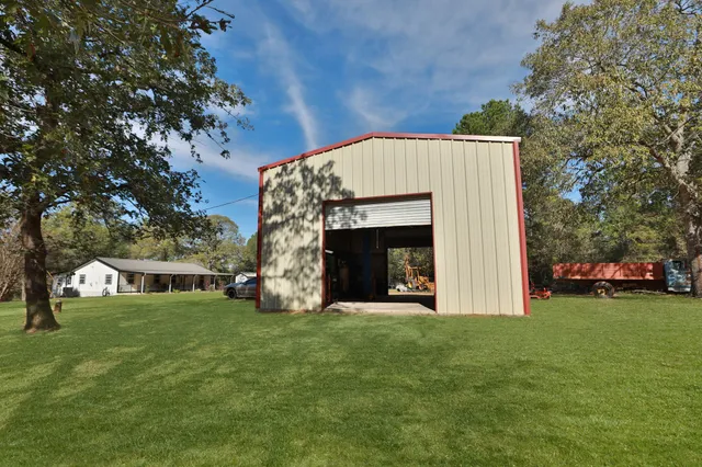 a view of a garden with an outdoor space
