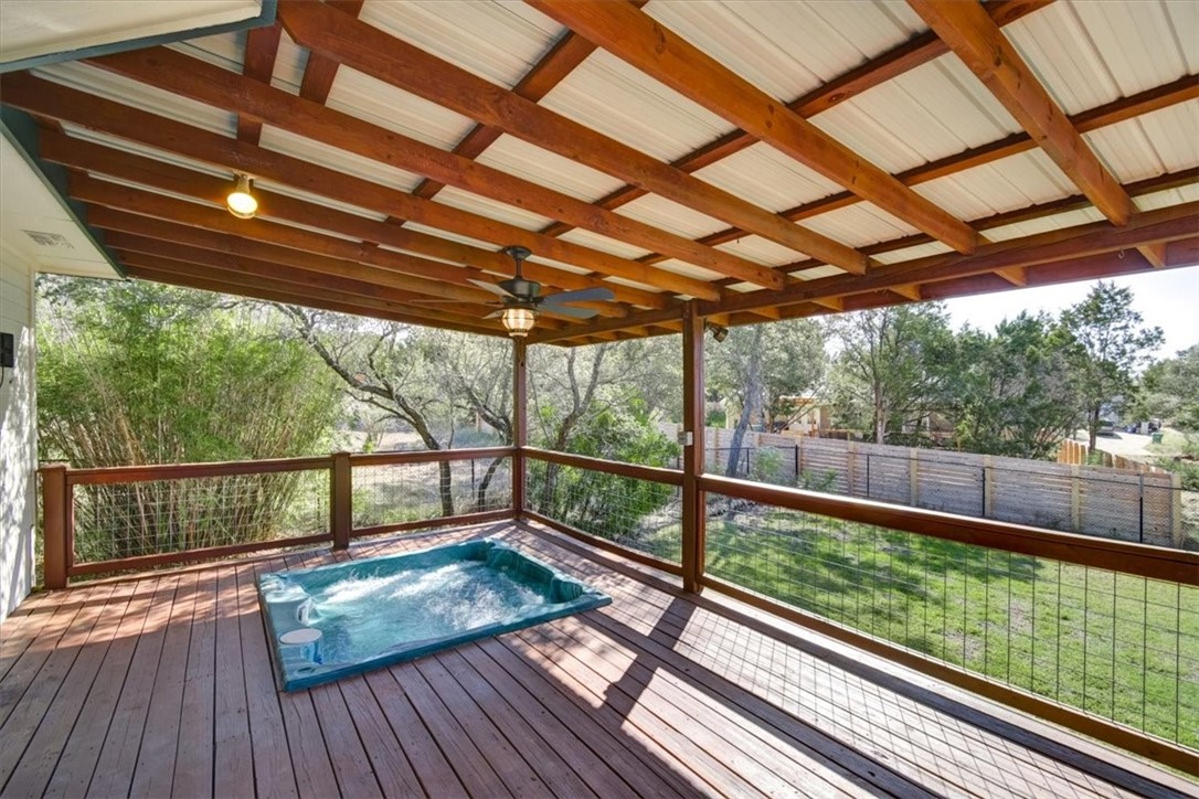 21415 Boggy Ford Road Lago Vista, TX 78645 - Photo 27 of 40 a view of a balcony with wooden floor