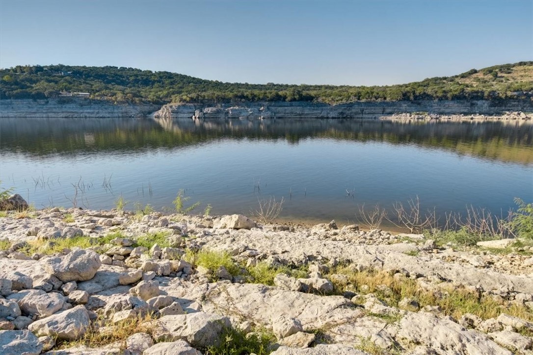 21415 Boggy Ford Road Lago Vista, TX 78645 - Photo 35 of 40 a view of a lake with a mountain