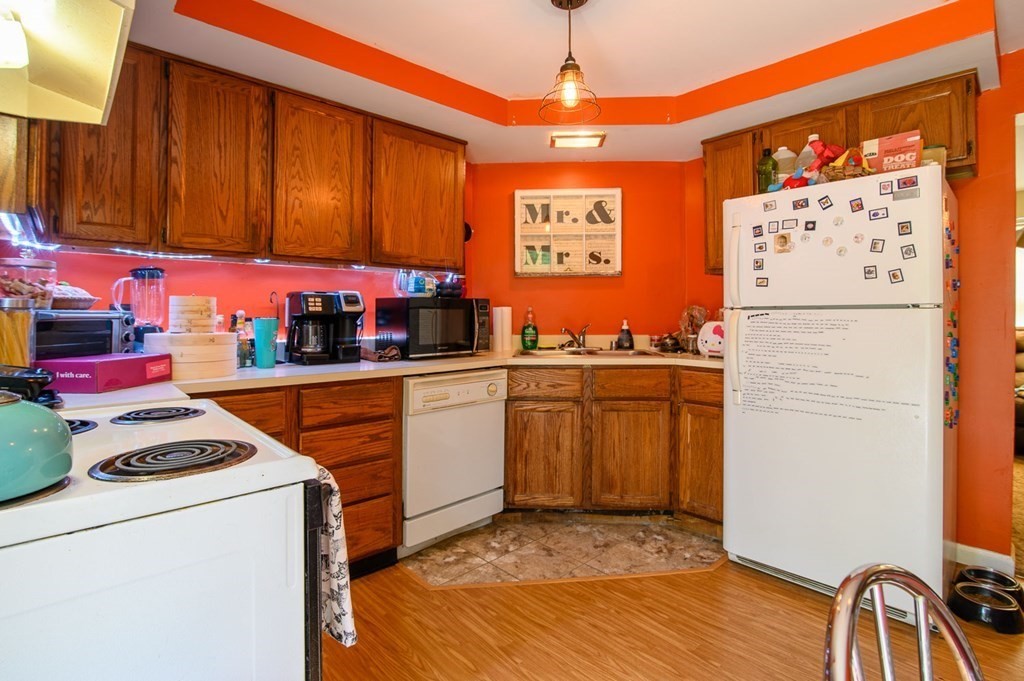 394 Bemis Road Warren, MA 01585 - Photo 23 of 35 a utility room with fridge dryer and washer