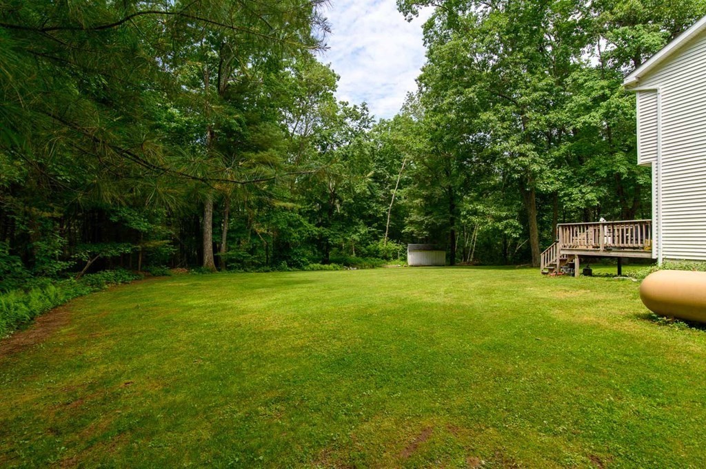 394 Bemis Road Warren, MA 01585 - Photo 29 of 35 a view of a backyard with a garden