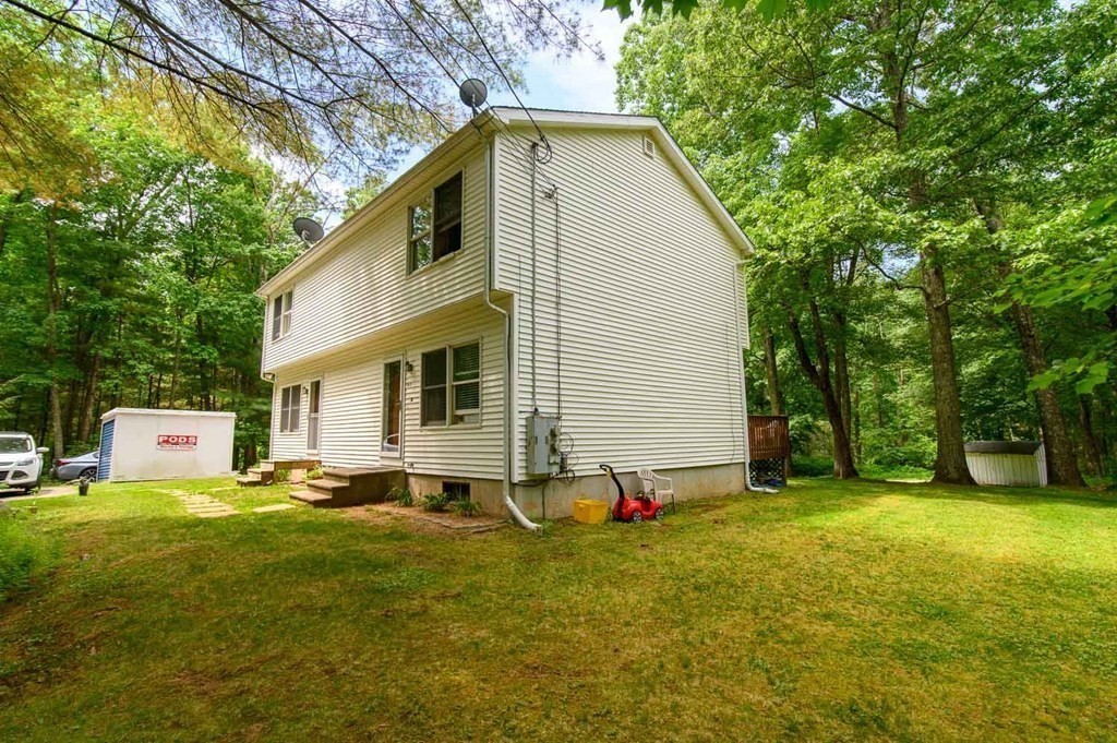 394 Bemis Road Warren, MA 01585 - Photo 3 of 35 a view of backyard with swimming pool