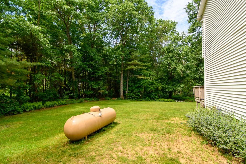 394 Bemis Road Warren, MA 01585 - Photo 35 of 35 a view of a pool with a yard
