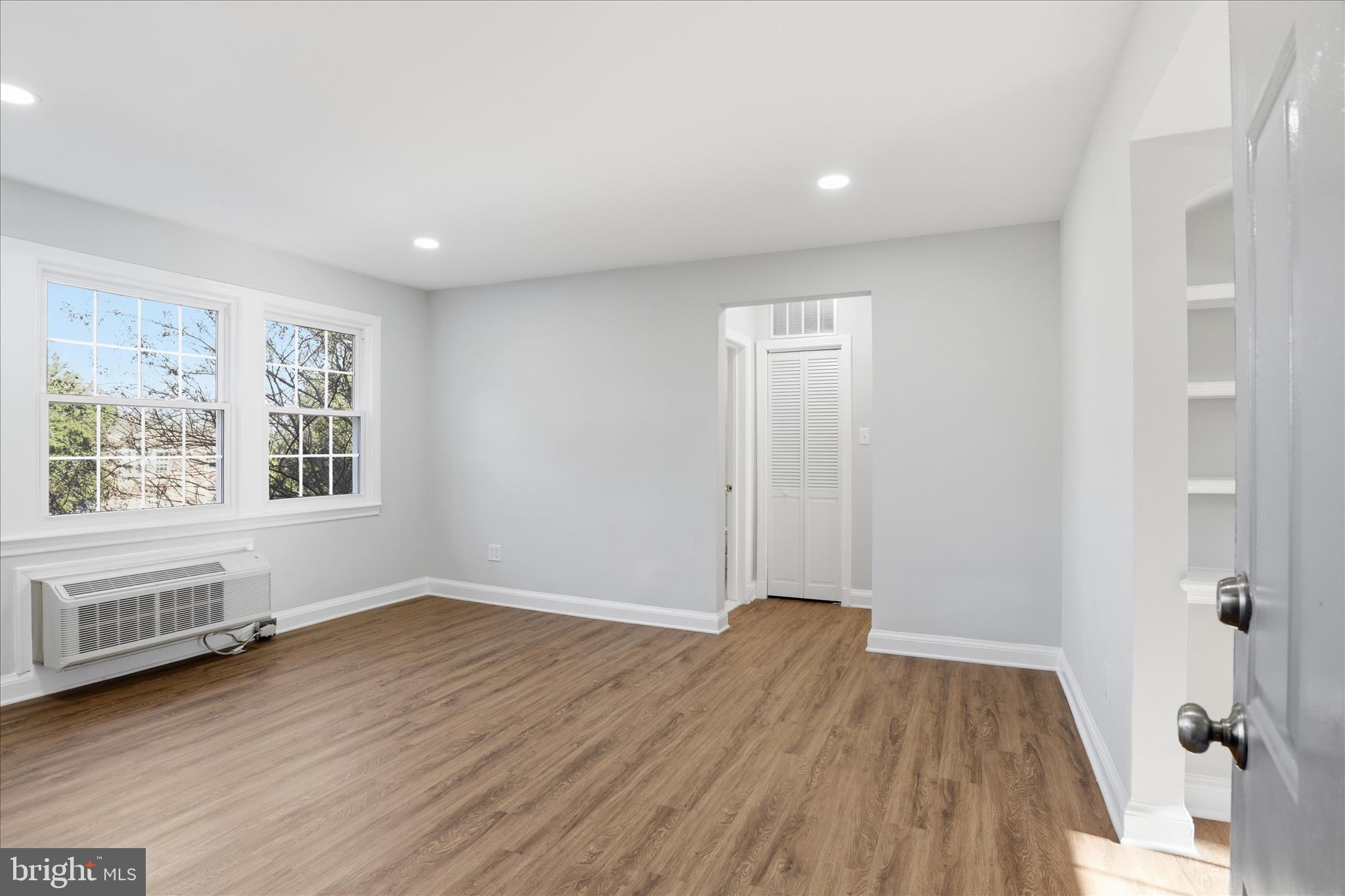 1804 West Abingdon Drive, Unit 201 Alexandria, VA 22314 - Photo 4 of 24 a view of livingroom with hardwood