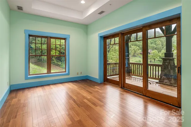 a view of entryway with wooden floor