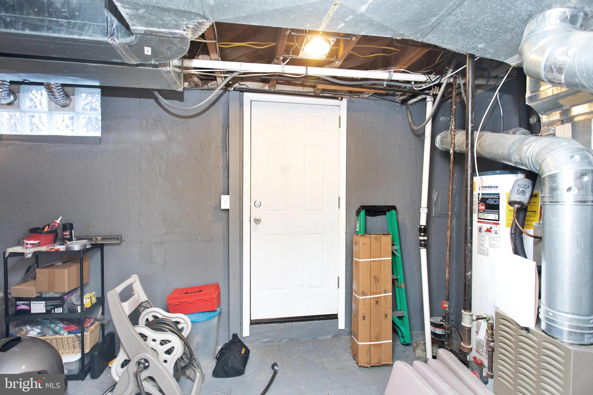 1678 Kirkwood Road Baltimore, MD 21207 - Photo 29 of 34 STORAGE & UTILTY ROOM DOOR LEADING TO OUTSIDE