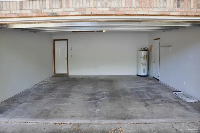 a view of a livingroom with a dishwasher and a kitchen stove
