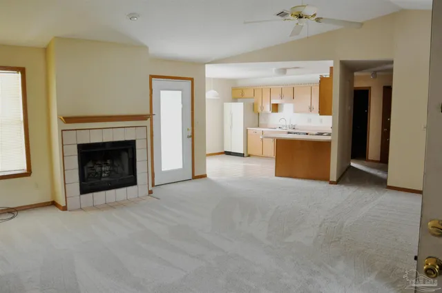 a view of a livingroom with a fireplace