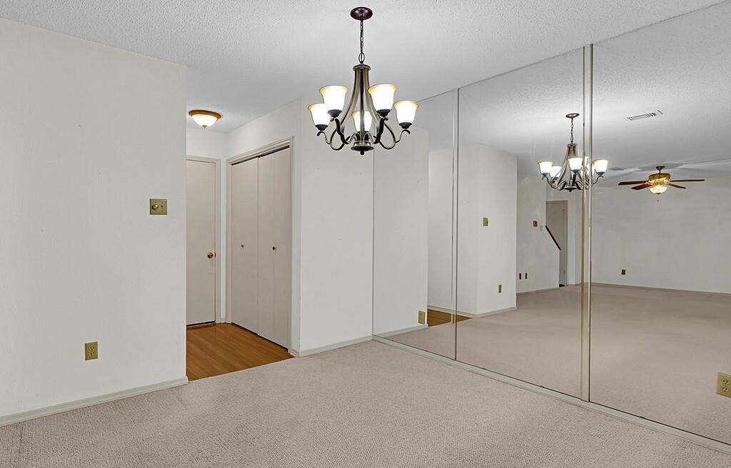 112 Pleasant Grove Lane Waco, TX 76712 - Photo 15 of 34 a view of an empty room with chandelier fan